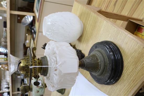 Two Victorian oil lamps and a centrepiece